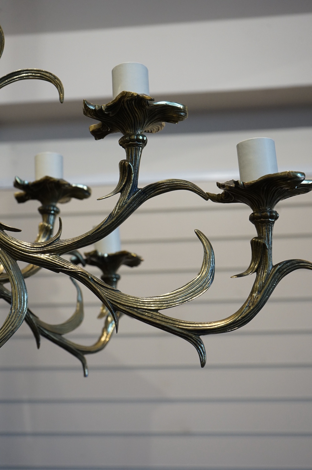 A large ornate brass six branch twelve light chandelier, 74cm high x 88cm wide. Condition - good